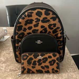 COACH NWOT Court Backpack and matching checkbook/wallet.